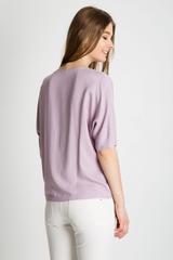 Luźna bluzka z wiązaniem u dołu