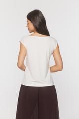 Knitted ecu blouse with a boat neckline