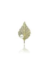 A gold leaf-shaped brooch with cubic zirconia and a pearl