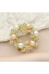 A gold brooch in the shape of a wreath with powder-coloured pearls