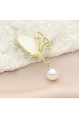 An elegant gold butterfly brooch with a pearl and cubic zirconia