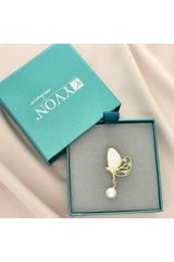 An elegant gold butterfly brooch with a pearl and cubic zirconia
