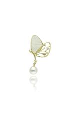 An elegant gold butterfly brooch with a pearl and cubic zirconia