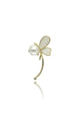 A gold butterfly brooch with mother-of-pearl and a large pearl