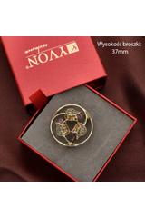 Złota broszka w stonowanych kolorach