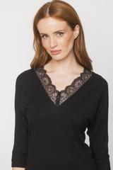 Black knit blouse with lace at the neckline
