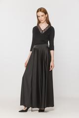 Black knit blouse with lace at the neckline