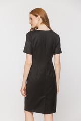 A timeless black dress with short sleeves