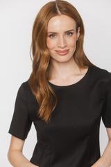 A timeless black dress with short sleeves