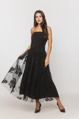 A black tulle skirt with a delicate floral pattern