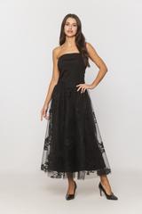 A black tulle skirt with a delicate floral pattern
