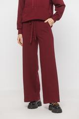 Dresowe bordowe spodnie z dekoracyjnym szwem