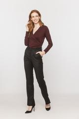 A burgundy knitted blouse with a wrap neckline and ruffles down the side