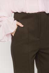 Dzianinowe spodnie z kieszeniami w kolorze ciemnej oliwki
