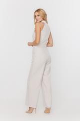 Elegancki beżowy kombinezon ze stójką i szeroką nogawką