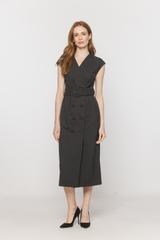 A graphite-coloured woollen dress that accentuates the shoulders and waist