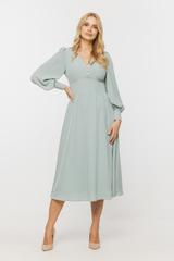 Koktajlowa zwiewna sukienka w seledynowym kolorze