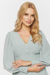 Koktajlowa zwiewna sukienka w seledynowym kolorze