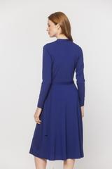 A plain wrap-around dress made from sapphire-coloured knitwear