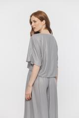 Short loose-fitting dress made of a slightly shiny lightweight fabric