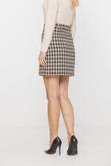 Short skirt made of thick fabric in the Chanel style