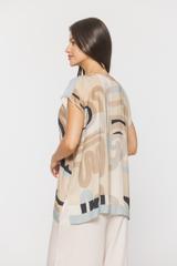 A lightweight viscose blouse with slits