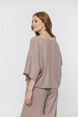 Przewiewna beżowa bluzka z tencelu  o luźnym kroju