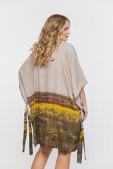 Luźna oryginalna tunika z troczkami w rękawach