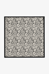 Soft silk scarf with a beige and black pattern
