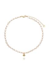 A necklace made of natural pearls with a gold heart pendant