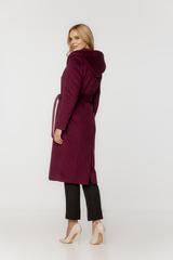 A purple woollen coat with a hood and a tie at the waist