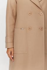 Długi beżowy płaszcz o szerokim prostym kroju