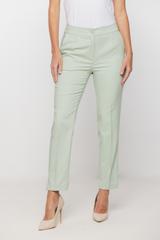 Seledynowe spodnie w kant z kieszeniami