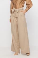 Szerokie beżowe spodnie z zakładami