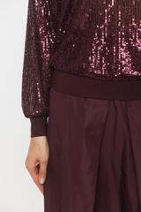 Stylowa luźna bluzka z cekinami i długim rękawem