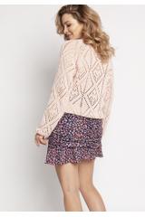 Pudrowy sweter w oversize'owej formie