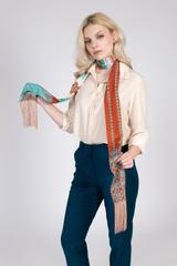 A stylish viscose scarf with fringes