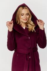 A purple woollen coat with a hood and a tie at the waist
