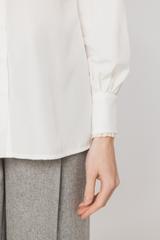 A light airy ECU shirt with a decorative lace stand-up collar