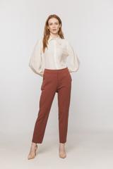 A light airy shirt made from textured cream-coloured viscose