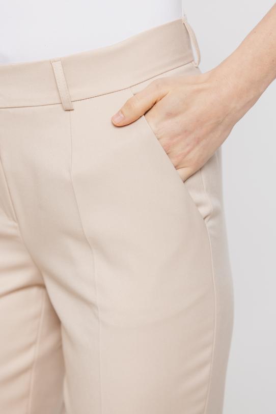 Beżowe spodnie w kant o klasycznym kroju - 4