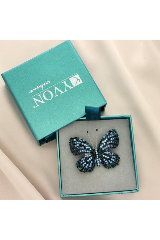 An elegant butterfly brooch with blue cubic zirconia stones - 1