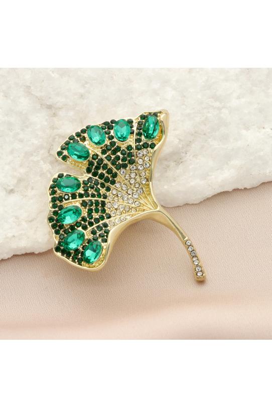 A gold brooch in the shape of a ginkgo leaf with green cubic zirconia stones - 1