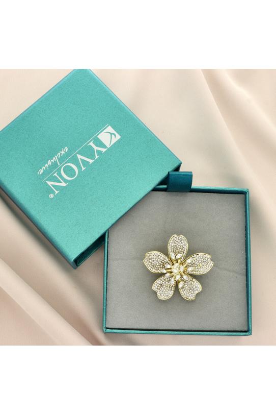 A gold flower brooch entirely set with cubic zirconia - 1