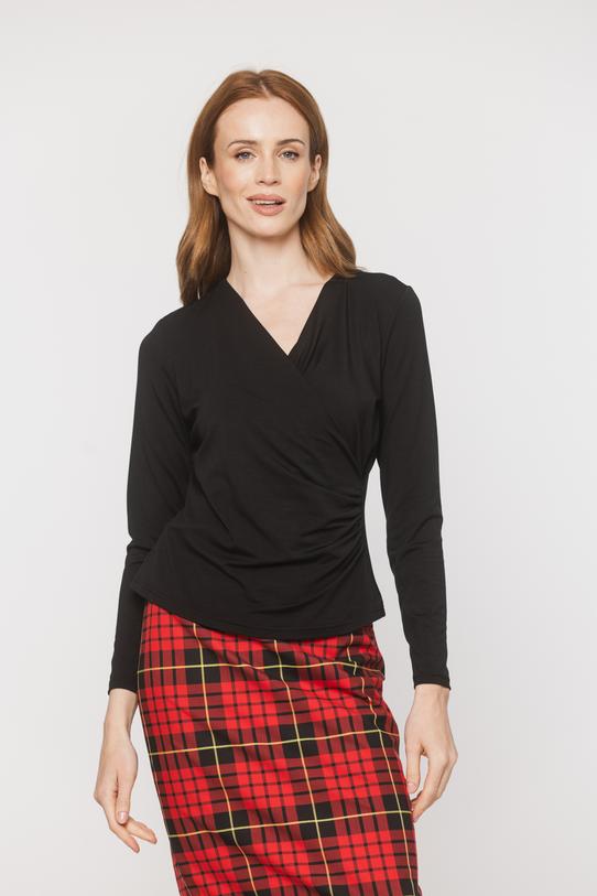 common:product-alt-prefix A black blouse with a deep wrap neckline and ruffles down the side