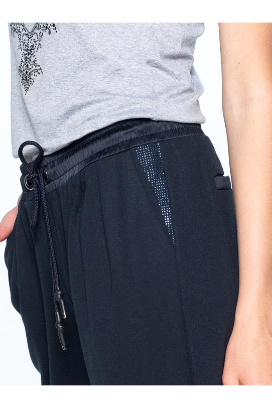 Spodnie dresowe z połyskującymi wstawkami - 5