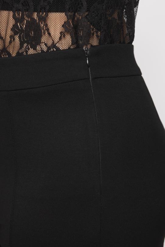 Zwężane eleganckie spodnie z czarnej dzianiny - 4