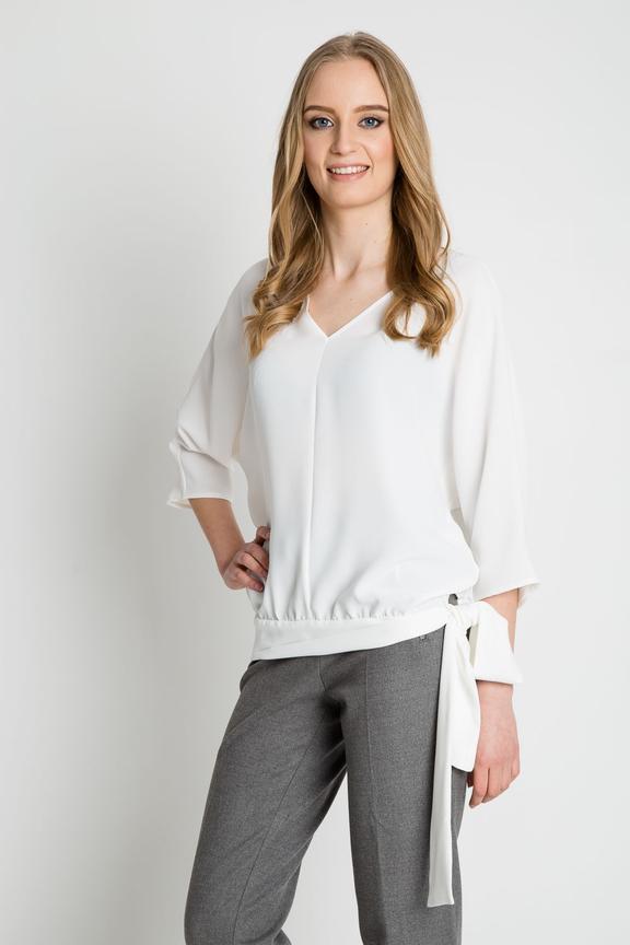 Bluzka w kolorze ecru z ozdobnym wiązaniem u dołu