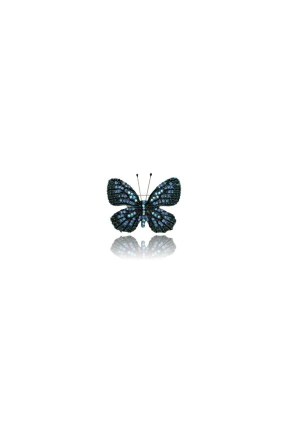 An elegant butterfly brooch with blue cubic zirconia stones