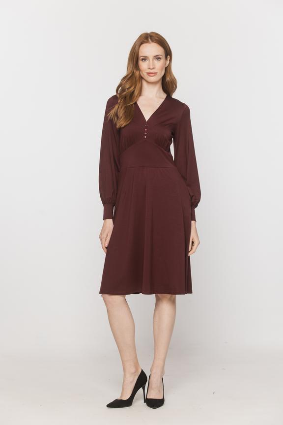 A burgundy women’s dress made from soft lyocell knit fabric